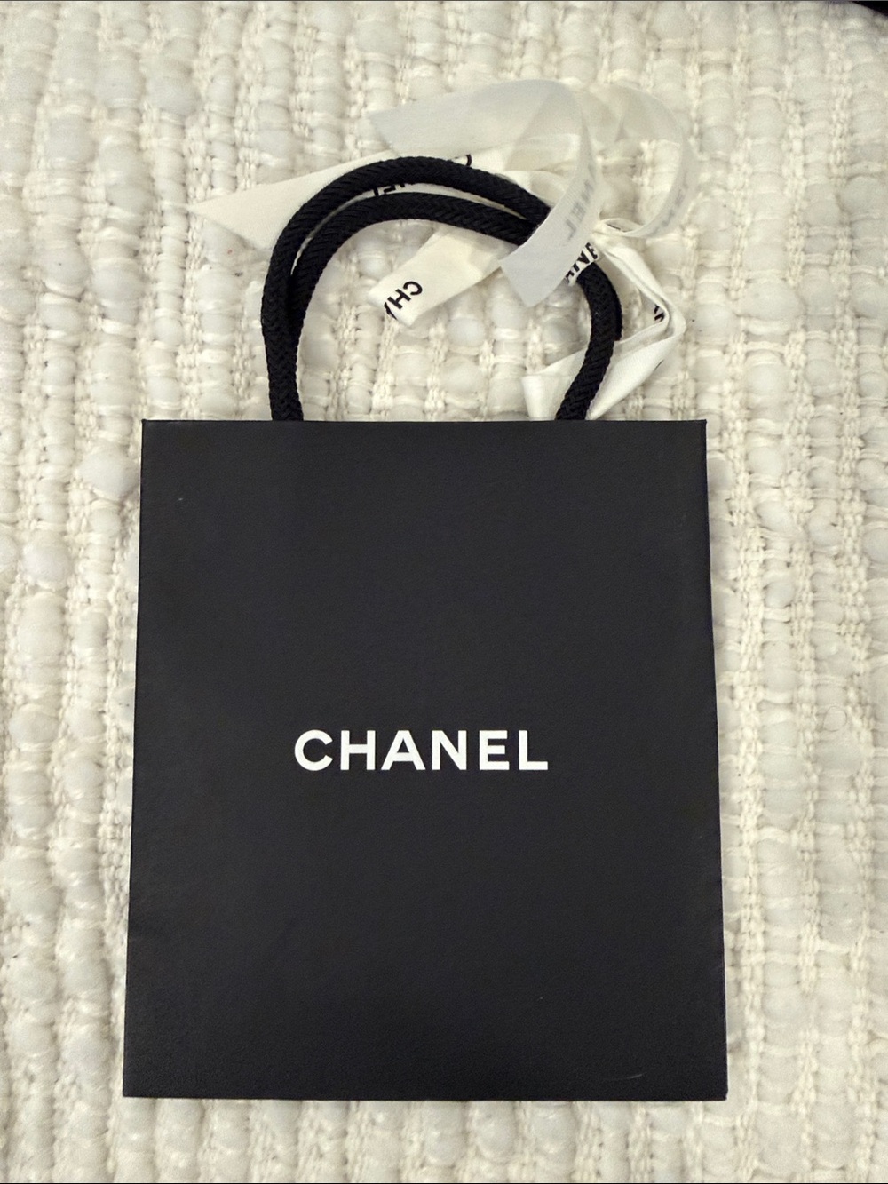 CHANEL Black Mini Shopping Bag with White Logo